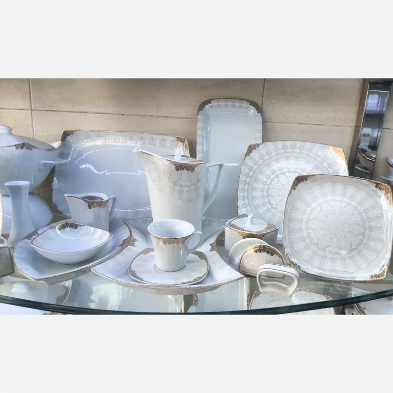 سرویس چینی پردیس طرح منچستر طلایی 105 پارچه (پس کرایه